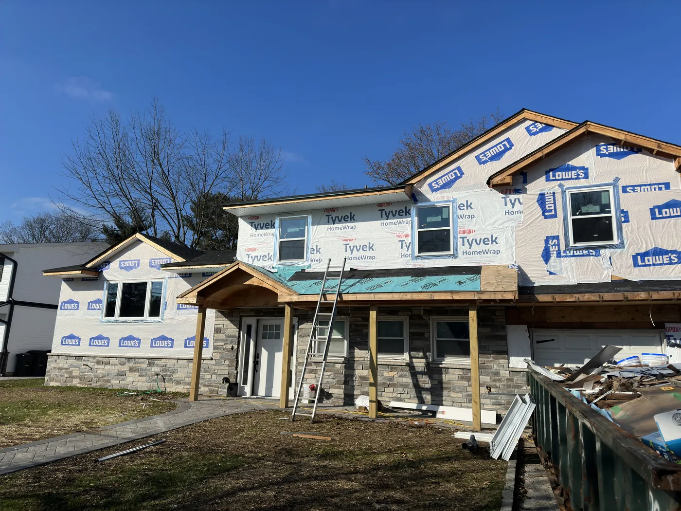 Construction site transformed into completed luxury home — before